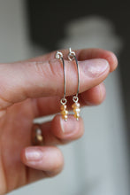 Load image into Gallery viewer, Dangly Sterling Silver + Peach Pearl Hoops
